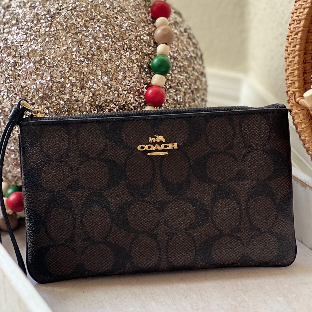 monogram Coach wristlet